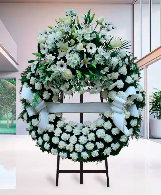 Corona Funeraria de claveles blancos para Blanca Dona